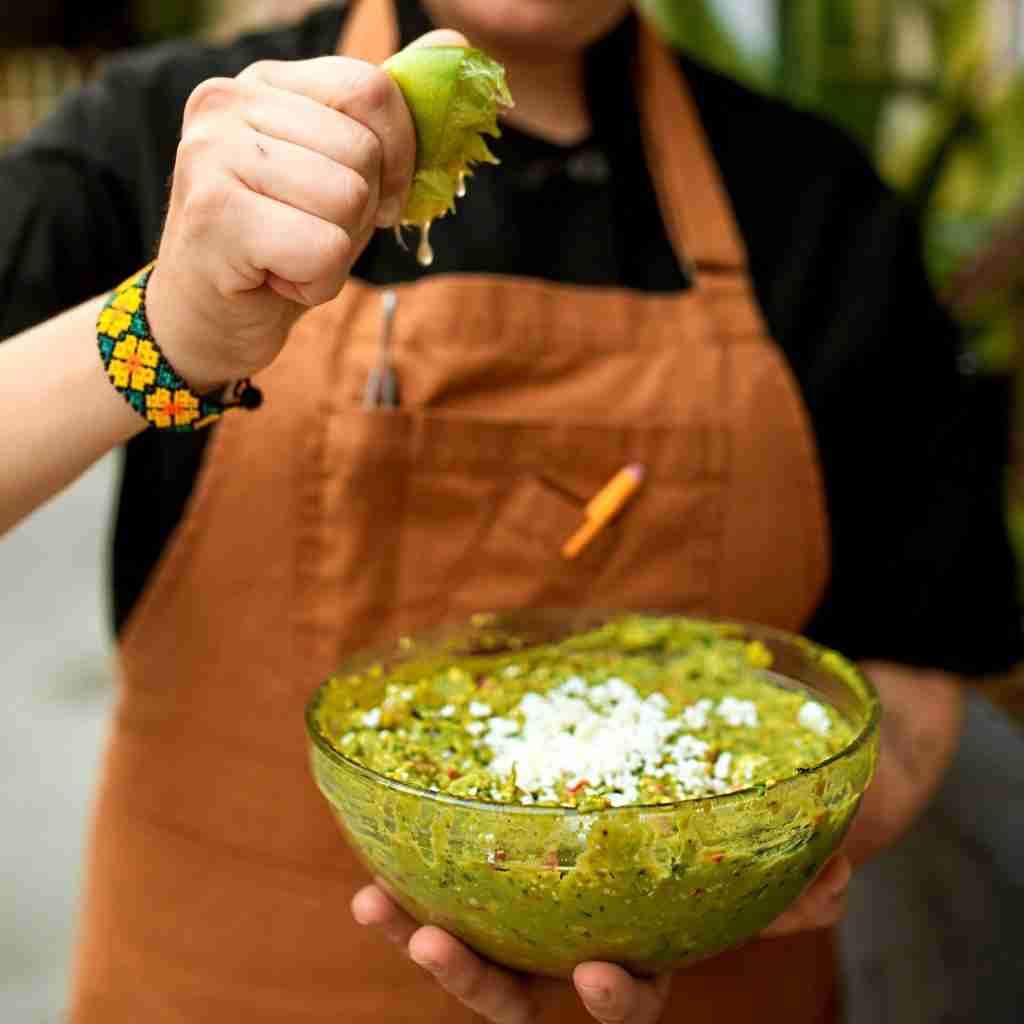 Fresh squeezed lime over guacamole